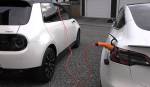 Часы Honda e Charge A Tesla Model 3
